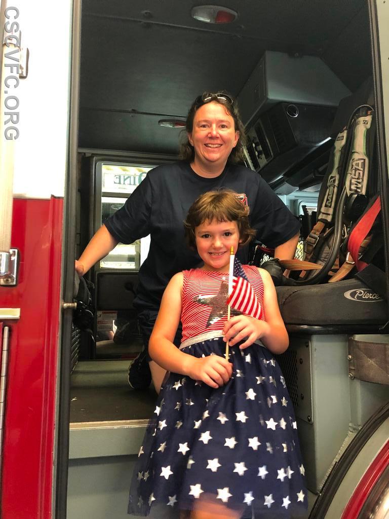 Member Michelle and daughter ready for the 4th of July parade